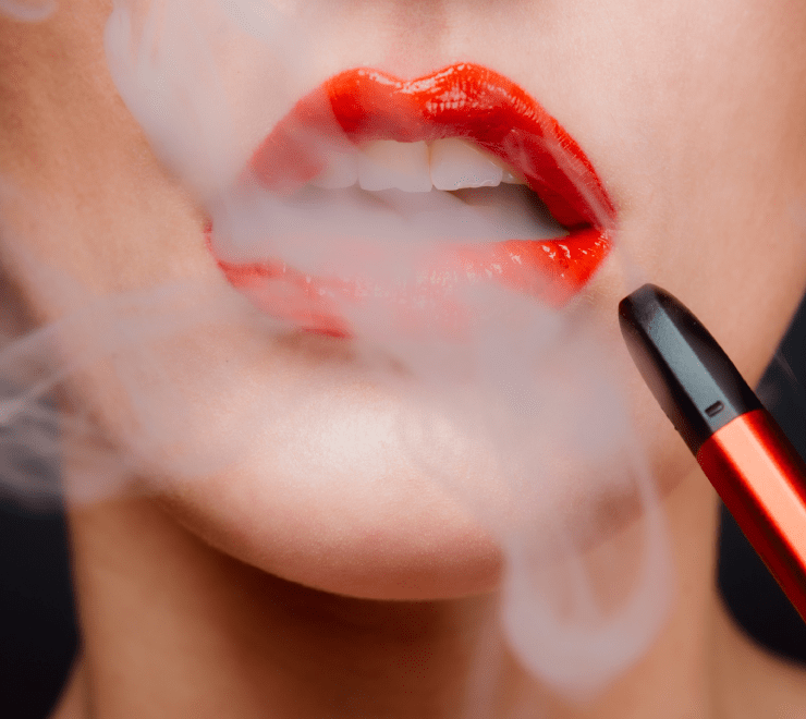 Close-Up of Woman Smoking Cigarette